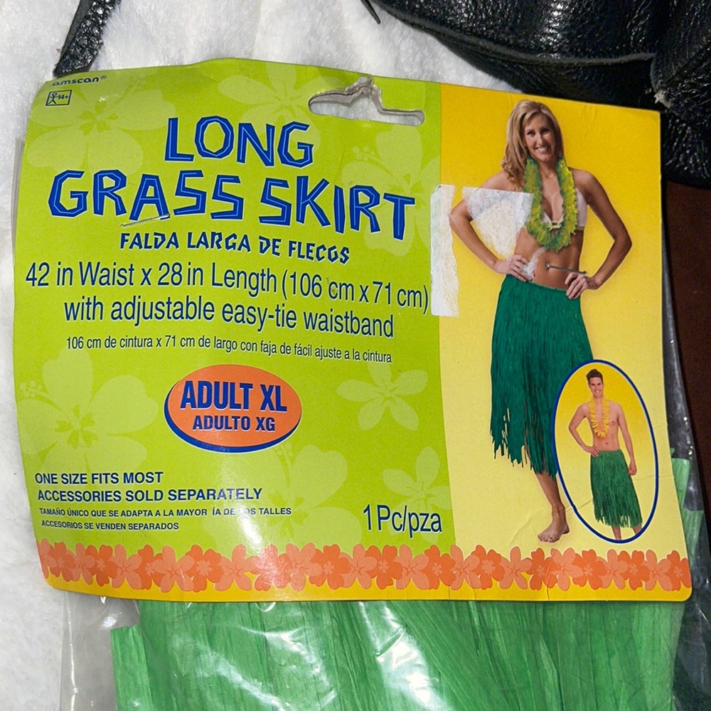 Brand new unused long grass skirt in unopen packaged